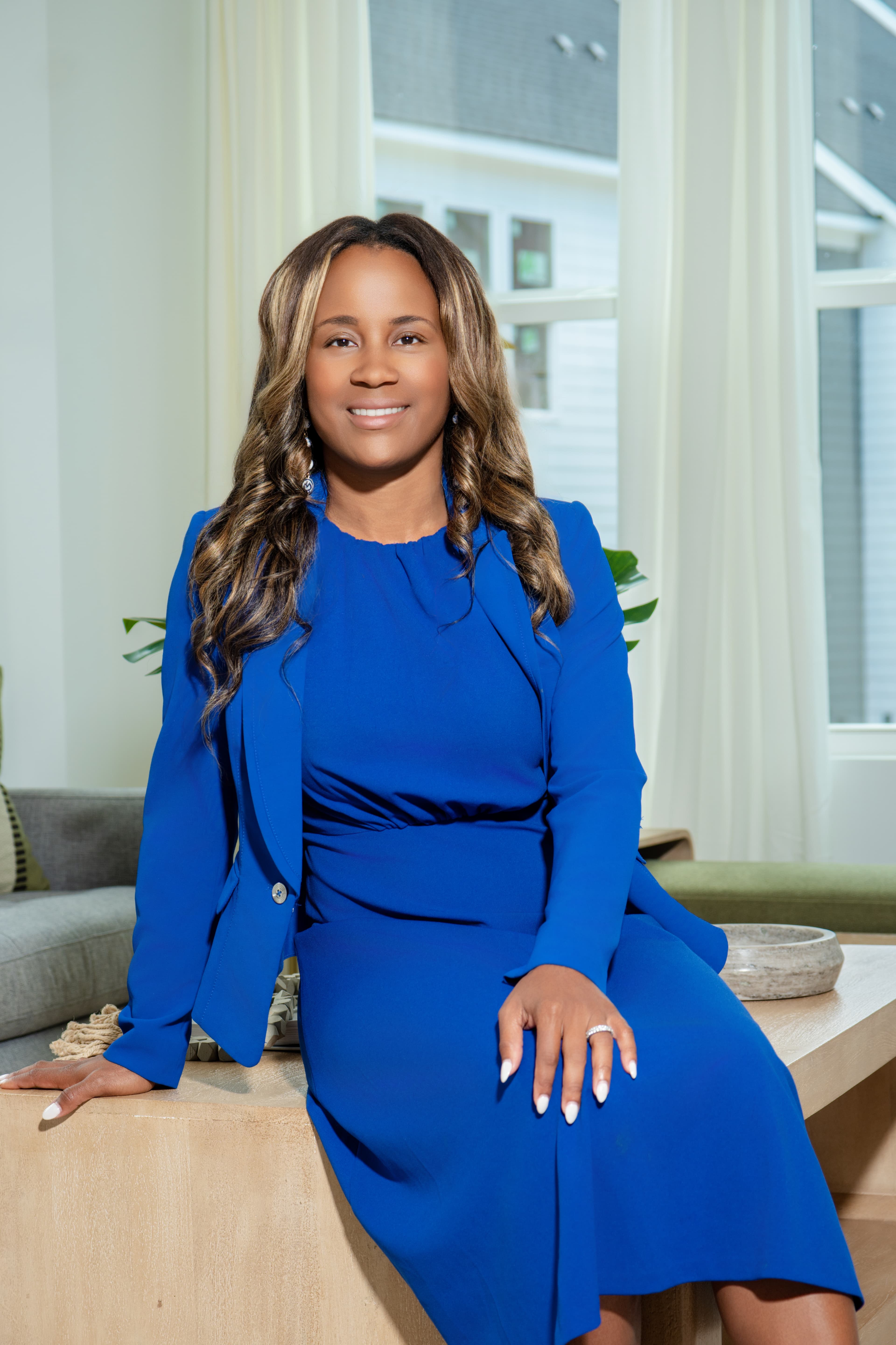 Chamiese Evans in a curated living room